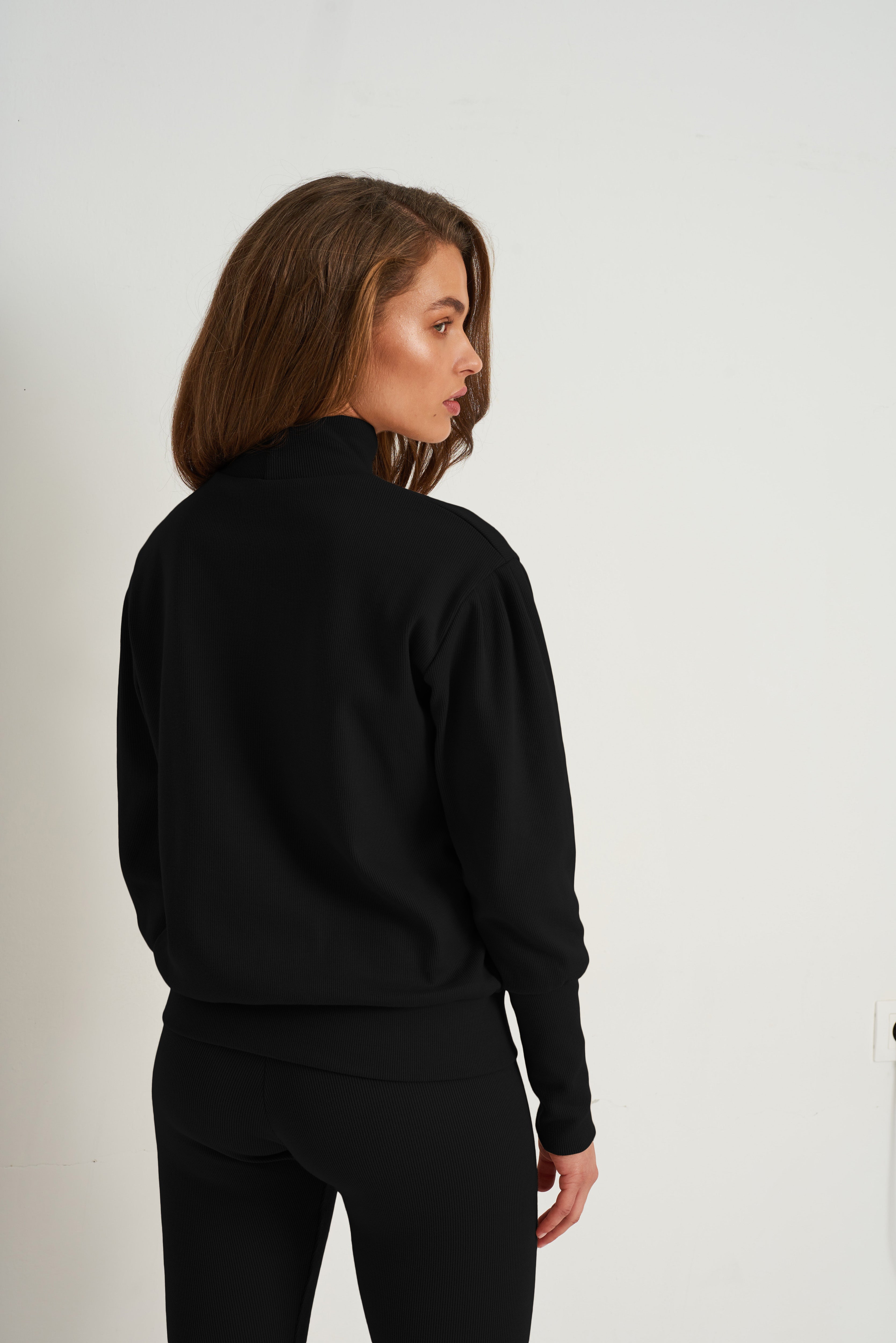 Nudyess Meru top Black luźny golf prążkowany